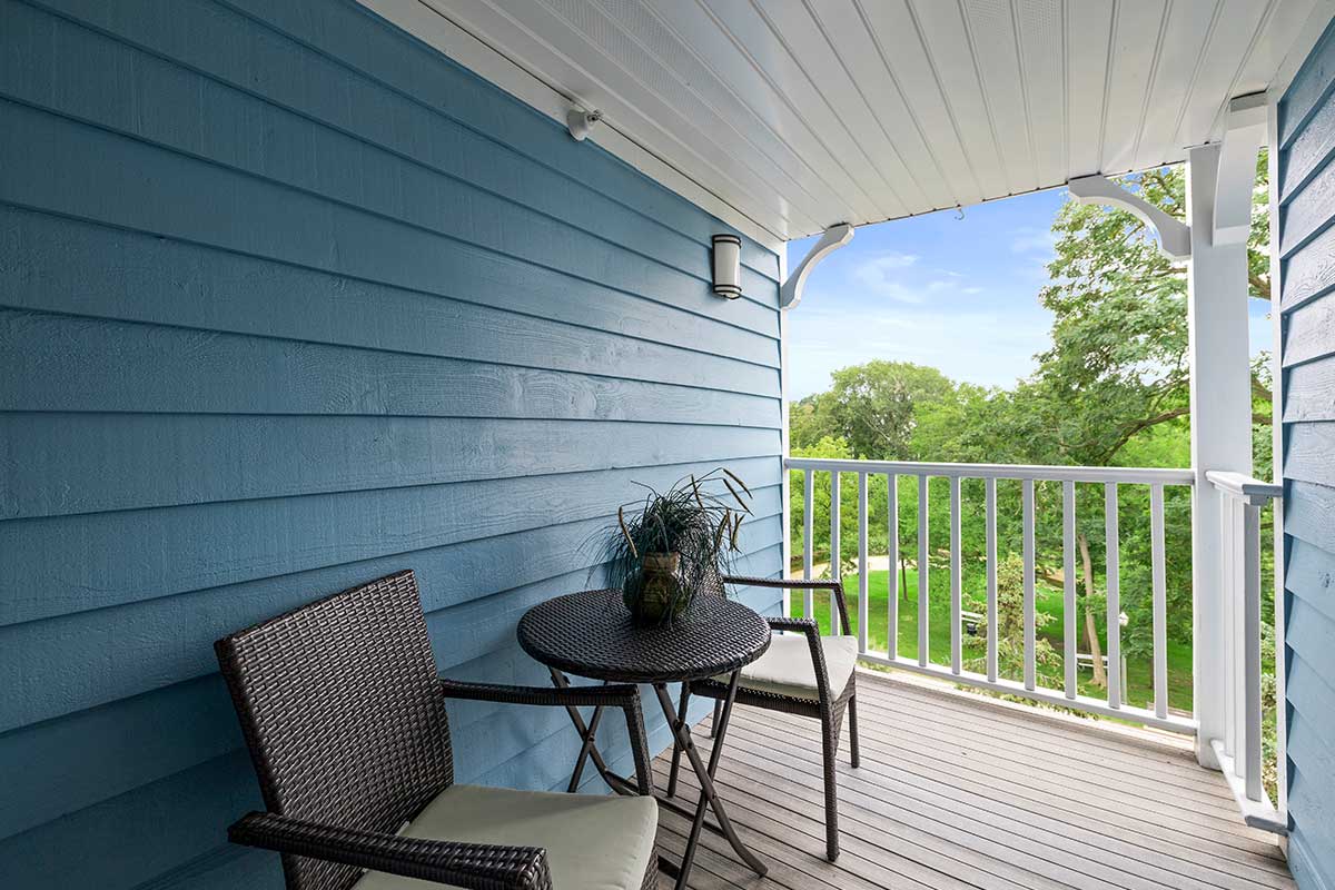 Platinum suite deck at The Mill Creek Hotel and Suites in Lake Geneva overlooking downtown and the White River